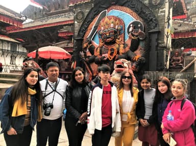 Group of tourists at a temple in Nepal