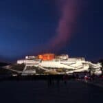 Potala Palace illuminated at night in Lhasa